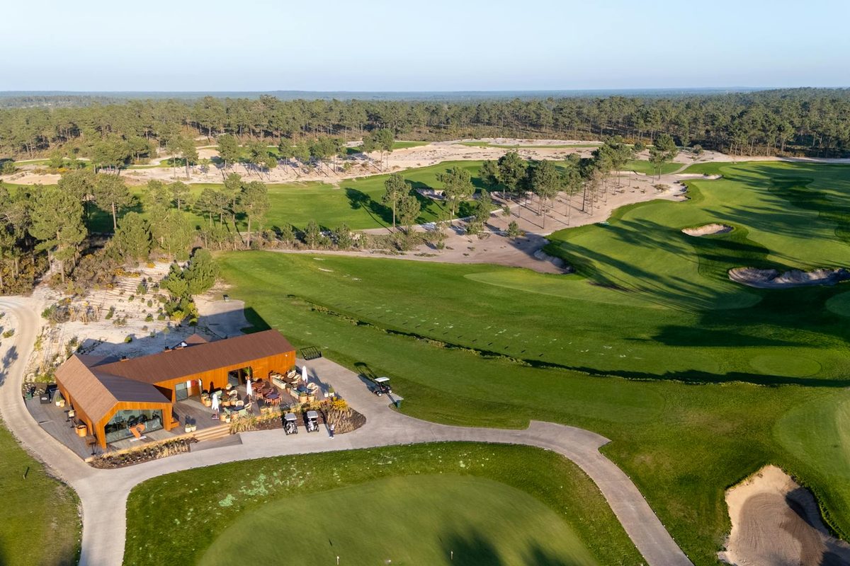 A sun-drenched Algarve golf course with immaculate fairways and a clear blue sky