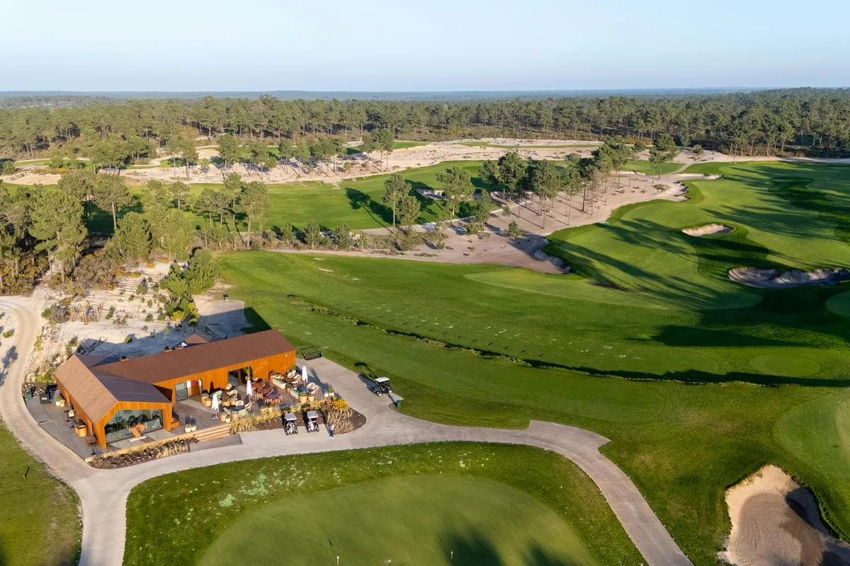 A sun-drenched Algarve golf course with immaculate fairways and a clear blue sky