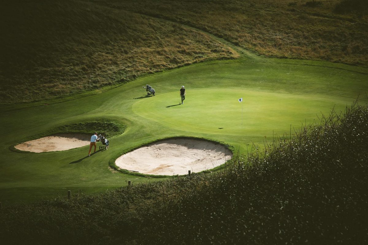 A well-maintained golf course in South Yorkshire with a panoramic view of rolling fairways