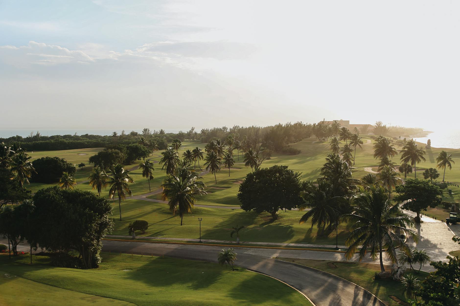 A luxury golf resort with a championship course set against rolling hills